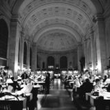 Elegant dinner beneath grand arches at the historic Boston Public Library hall.