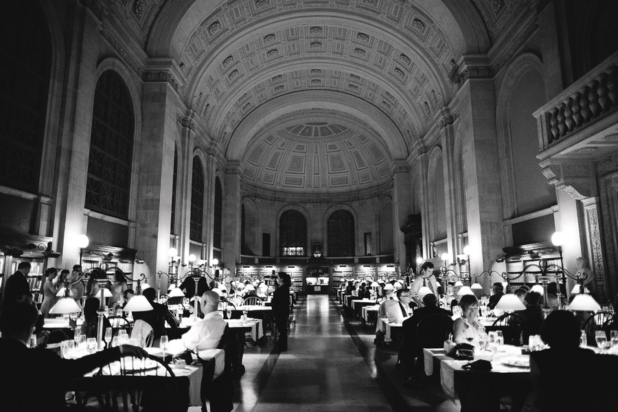 Elegant dinner beneath grand arches at the historic Boston Public Library hall.