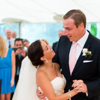 Bride and groom share a joyful first dance at Newagen Seaside Inn wedding in Maine.