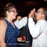 Laughing wedding guests enjoying a lively celebration at the Spring House Hotel on Block Island.