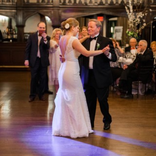 Father-daughter dance under chandeliers at Alden Castle wedding in Brookline, Massachusetts.
