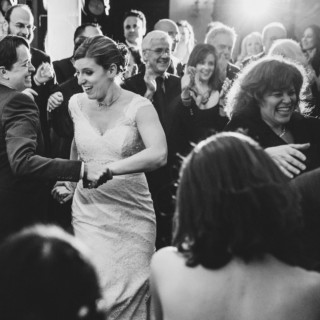 Joyful Jewish wedding dance at Alden Castle with happy couple surrounded by celebrating guests.