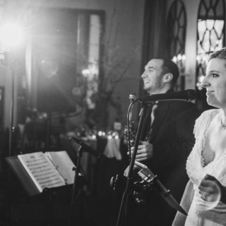 Bride and groom share a joyful moment during their Alden Castle wedding in Brookline, Massachusetts.