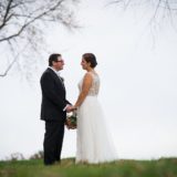 Bride and groom share a romantic outdoor moment at Gedney Farm wedding in Massachusetts.