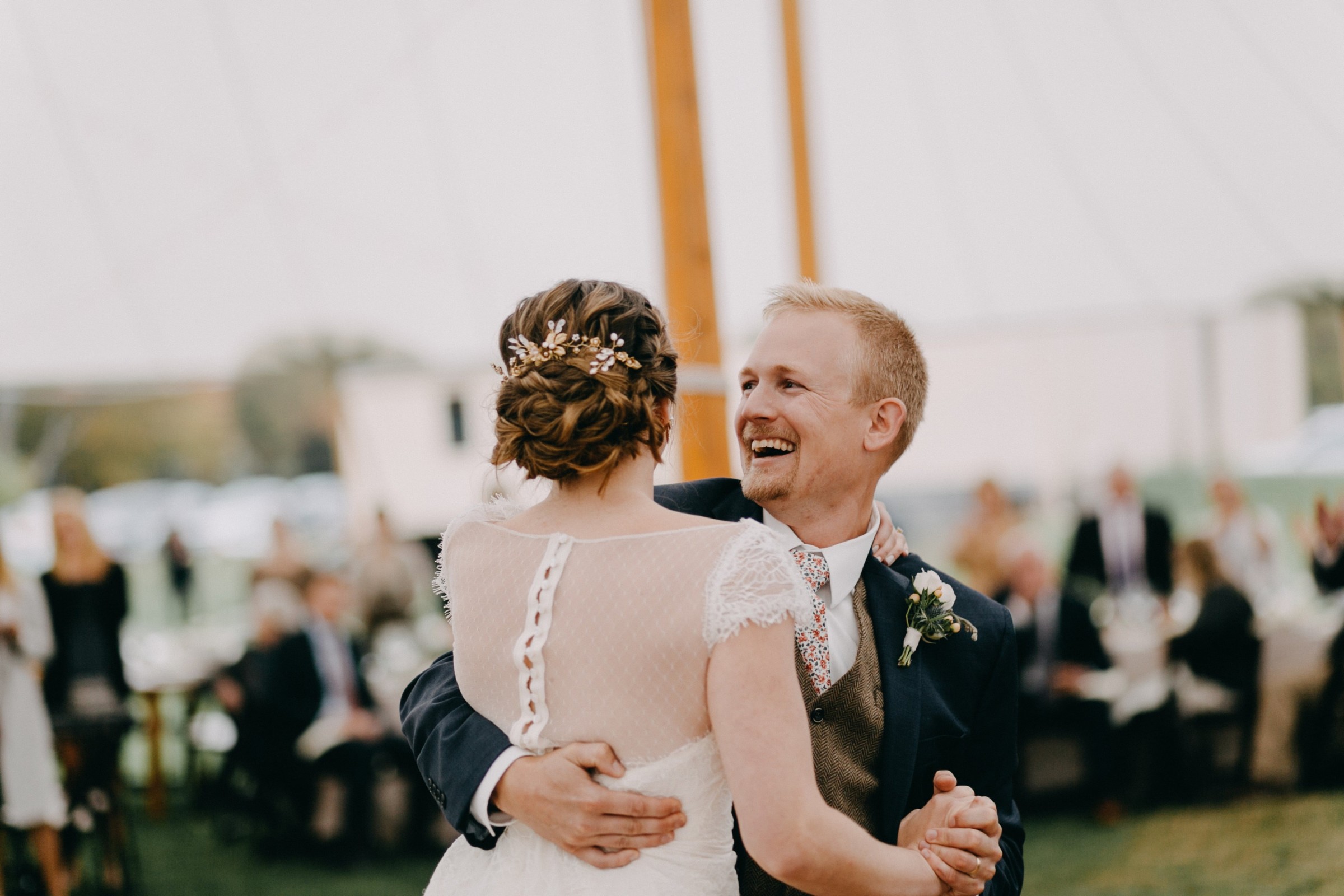 Bride and groom share a joyful first dance at Spencer-Peirce-Little Farm wedding.