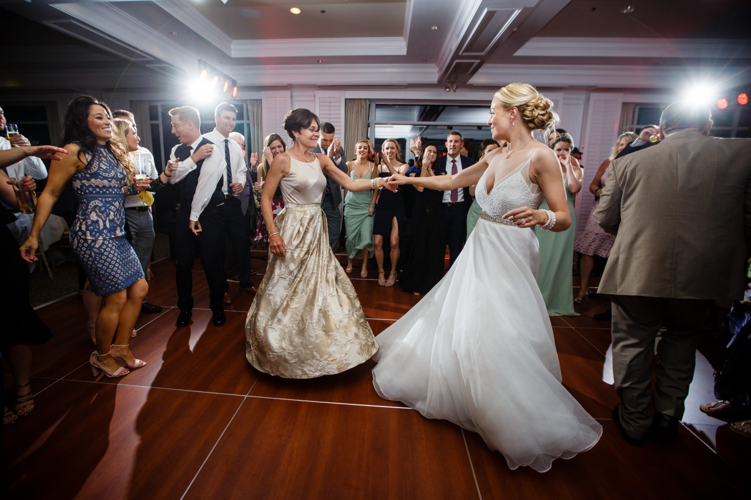 Bride dancing with her mother at joyful Willowbend Country Club wedding in Mashpee, Massachusetts.