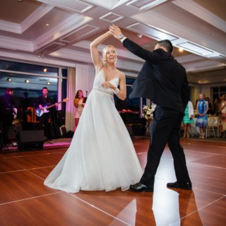 Bride and groom share their joyful first dance at Willowbend Country Club wedding in Mashpee.