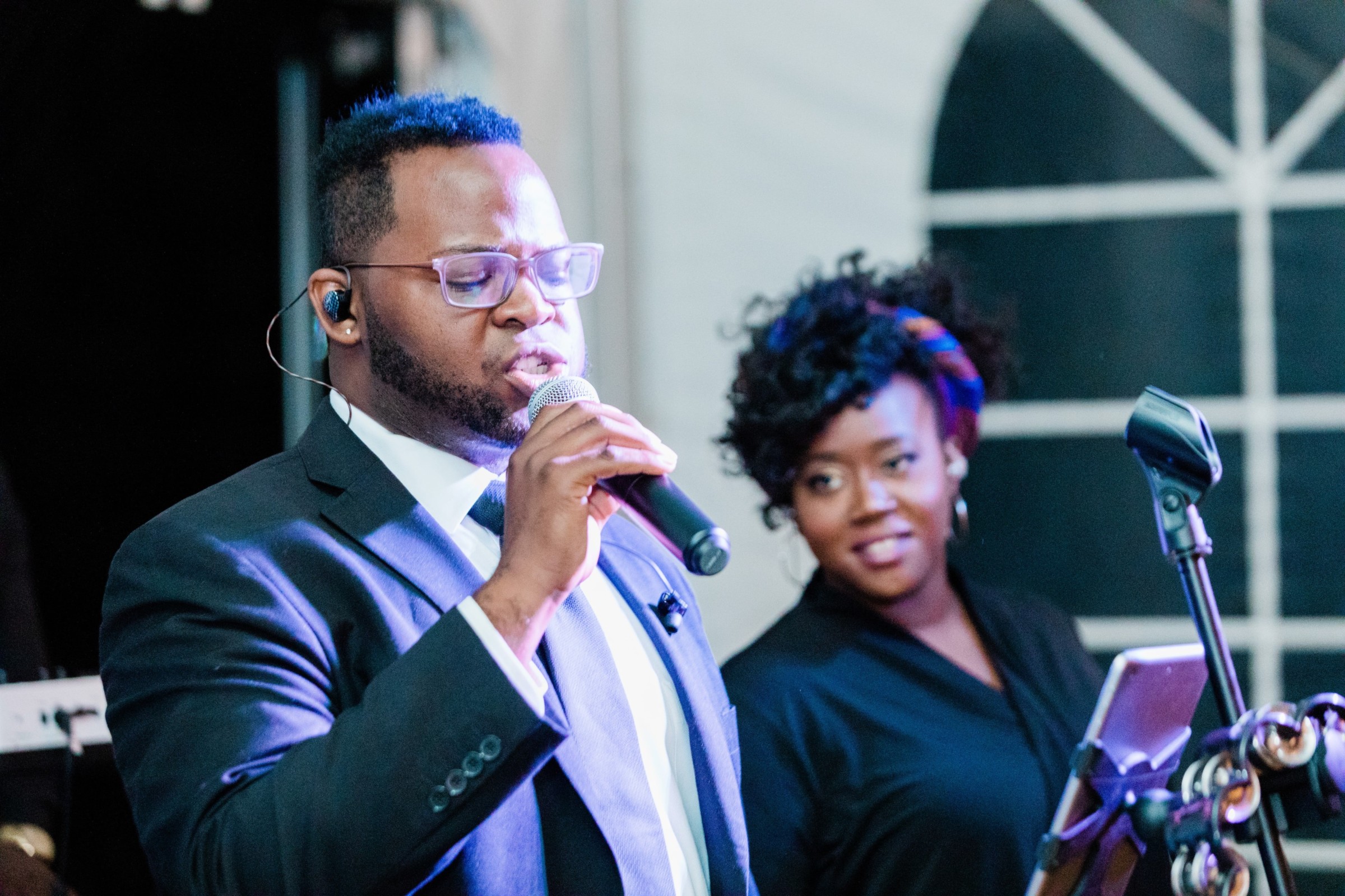Emotional wedding duet performance by male and female singers at Elm Bank in Wellesley, Massachusetts.