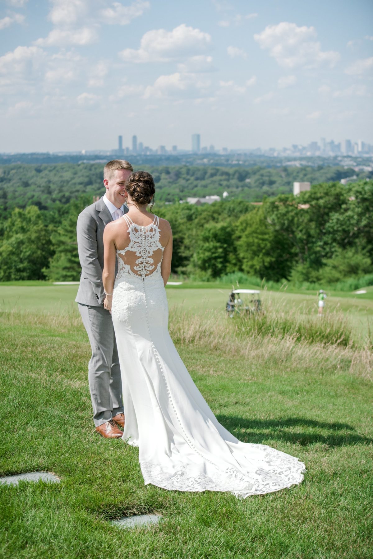 Bride and groom sharing a tender moment at Granite Links Golf Club in Quincy, Massachusetts.