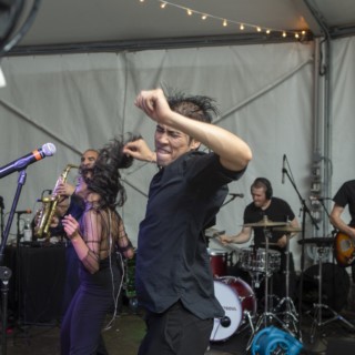 Energetic live band performance under canopy lights at Granite Links Golf Club in Quincy, MA.