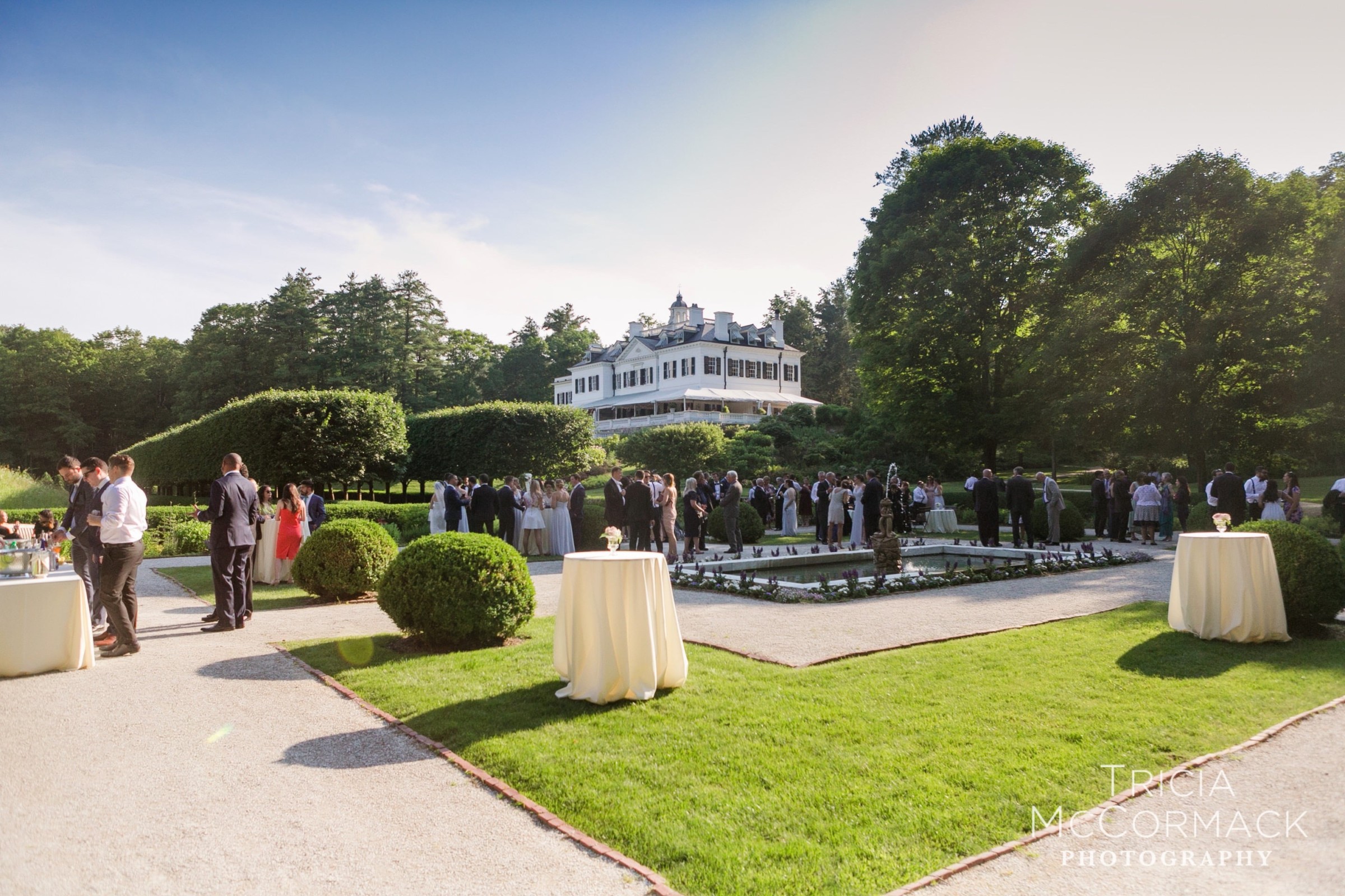 Elegant outdoor wedding reception at The Mount mansion garden in Lenox, Massachusetts.