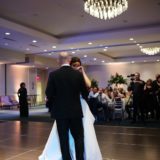 Bride and father share emotional dance at elegant Newport wedding reception.
