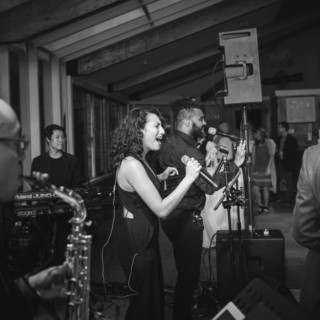 Joyful live band performing at an elegant wedding celebration in Pomfret, Vermont.