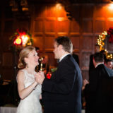 Bride and groom share a romantic first dance at an elegant holiday wedding in Boston.