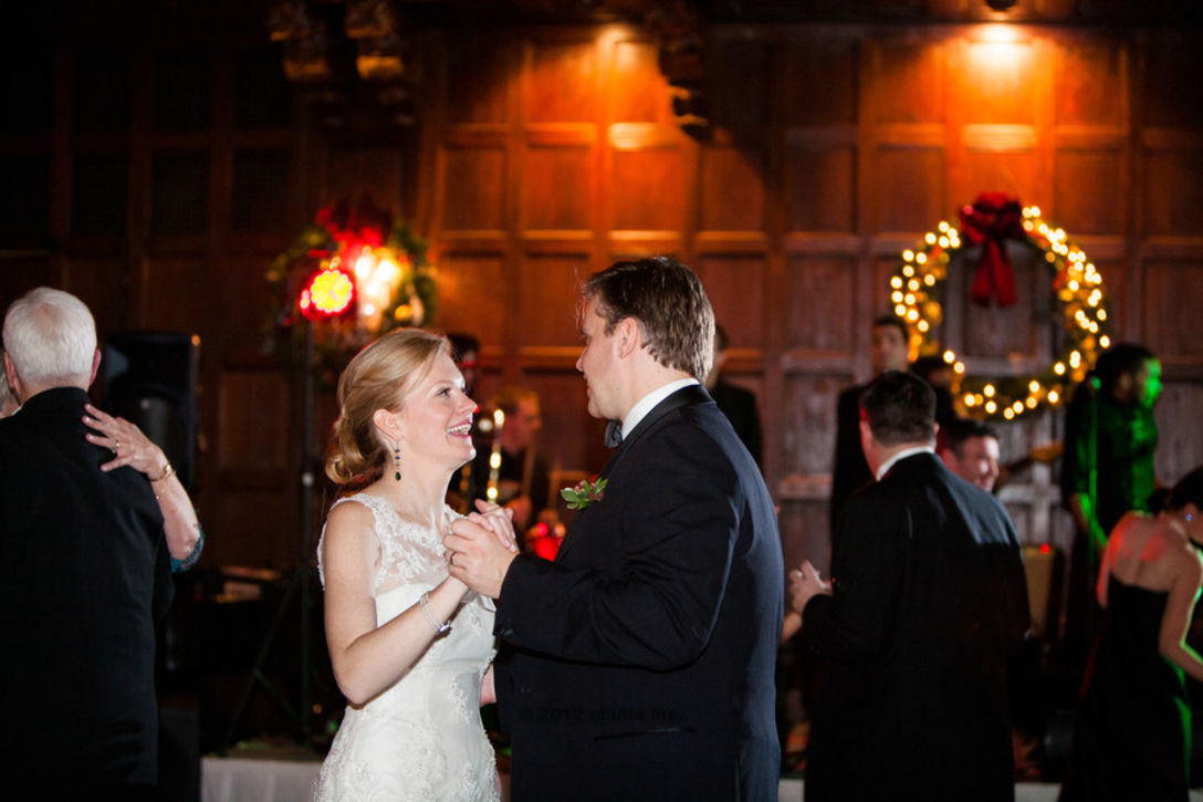 Bride and groom share a romantic first dance at an elegant holiday wedding in Boston.