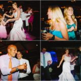 Bride and guests dancing joyfully at Taj Boston wedding reception under warm glowing lights.
