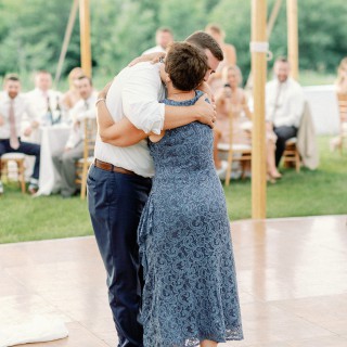 Groom shares heartfelt dance with his mother at Abenakee Club wedding in Maine.