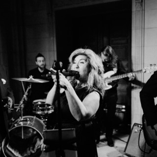 Black and white photo of a soulful live band performance at Aldrich Mansion in Warwick, Rhode Island.