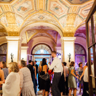 Guests dancing in an elegant ballroom at Aldrich Mansion in Warwick, Rhode Island.