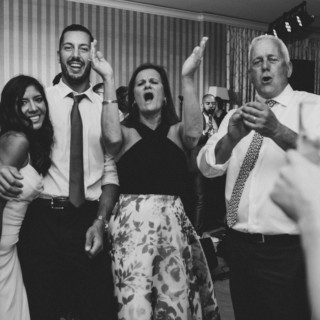 Guests dancing and celebrating joyfully at a lively Beauport wedding in Gloucester, Massachusetts.