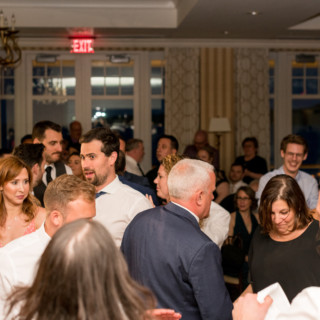 Guests celebrating at an elegant Beauport Hotel wedding reception in Gloucester, Massachusetts.