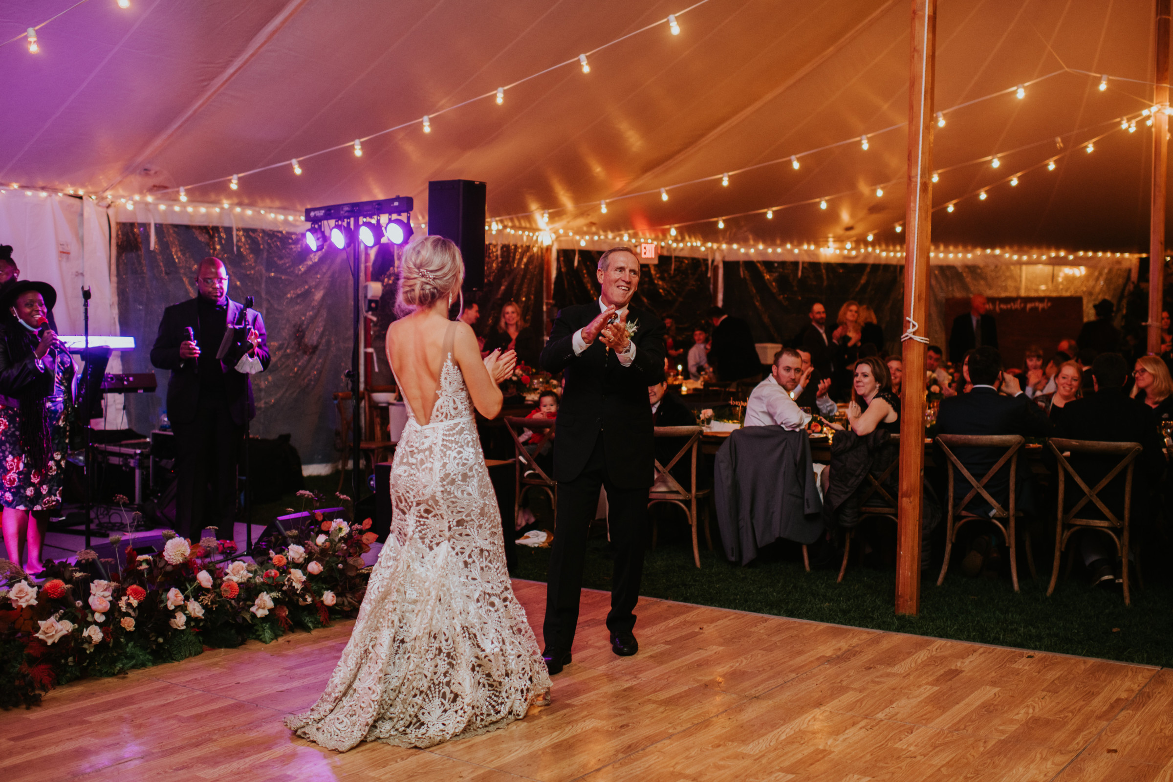 Father-daughter dance under glowing tent at Toad Hill Farm wedding in Franconia, New Hampshire.