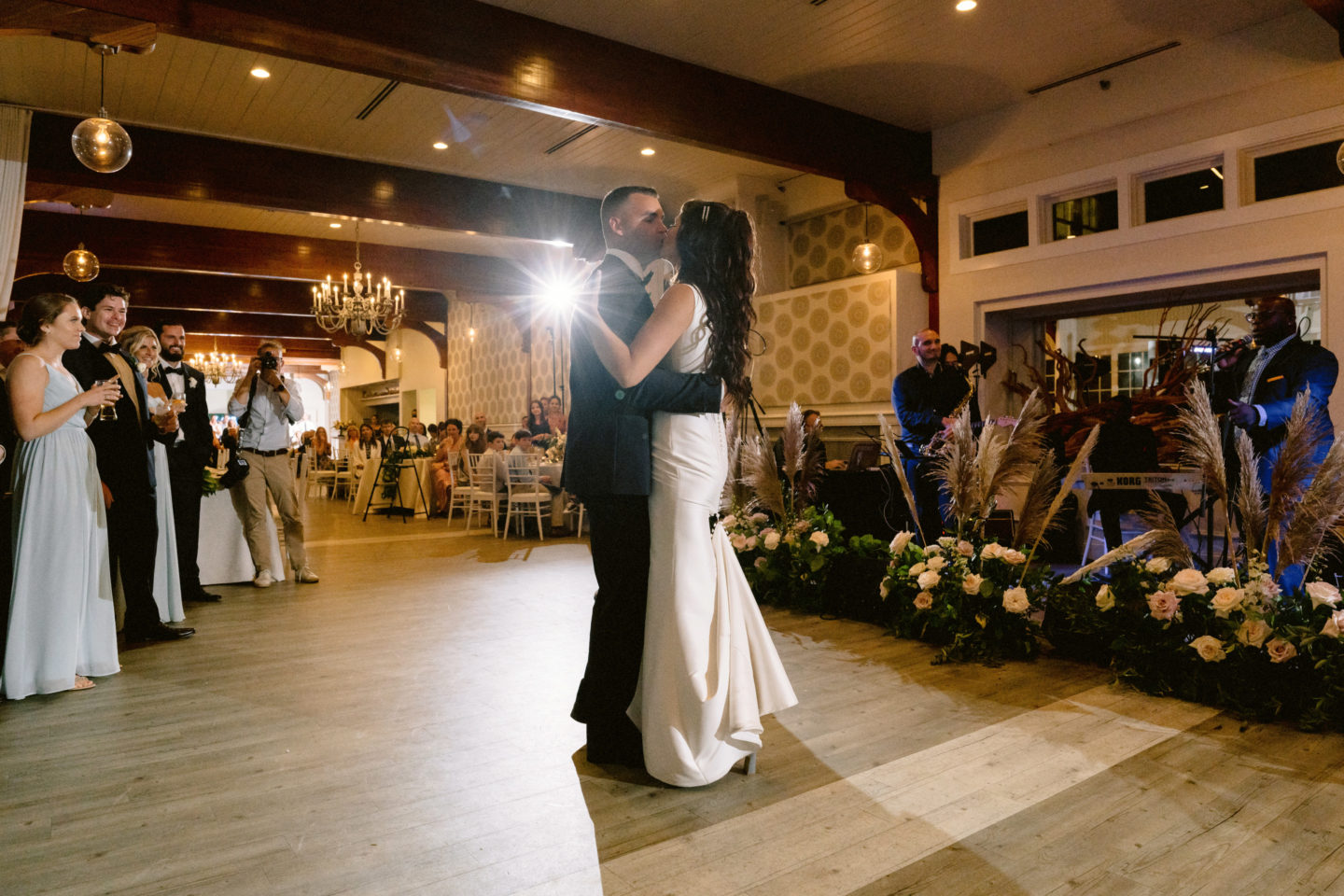 Bride and groom share a romantic first dance at Wychmere Beach Club wedding reception.
