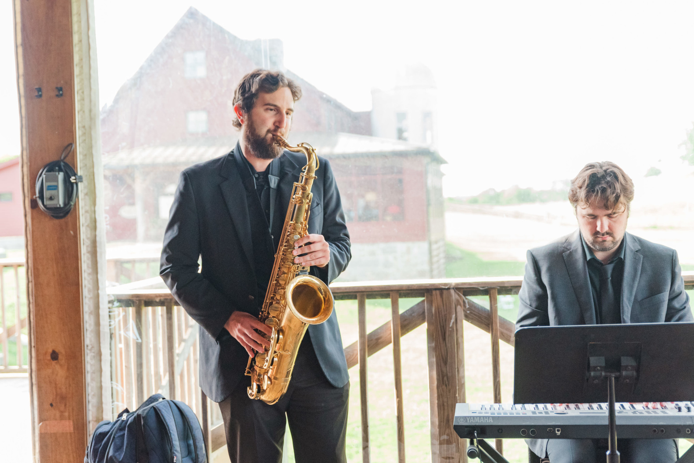 Jazz duo performing at rustic barn wedding in Groton, Massachusetts.