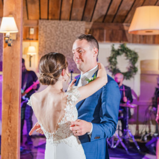 Bride and groom share a romantic first dance at rustic Gibbet Hill wedding in Groton, Massachusetts.