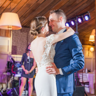 Bride and groom share a romantic first dance at rustic Gibbet Hill wedding in Groton, Massachusetts.