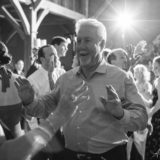 Older man dancing joyfully at rustic Harrington Farm wedding in Princeton, Massachusetts.