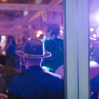 Drummer performing at lively Marianmade Farm wedding in Wiscasset, Maine.