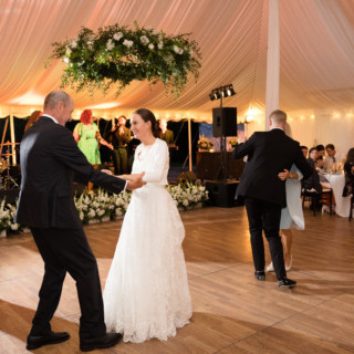 Bride dancing with her father at elegant Topnotch Resort wedding in Stowe, Vermont.