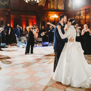 Bride and groom share romantic first dance at elegant Boston Public Library wedding reception.