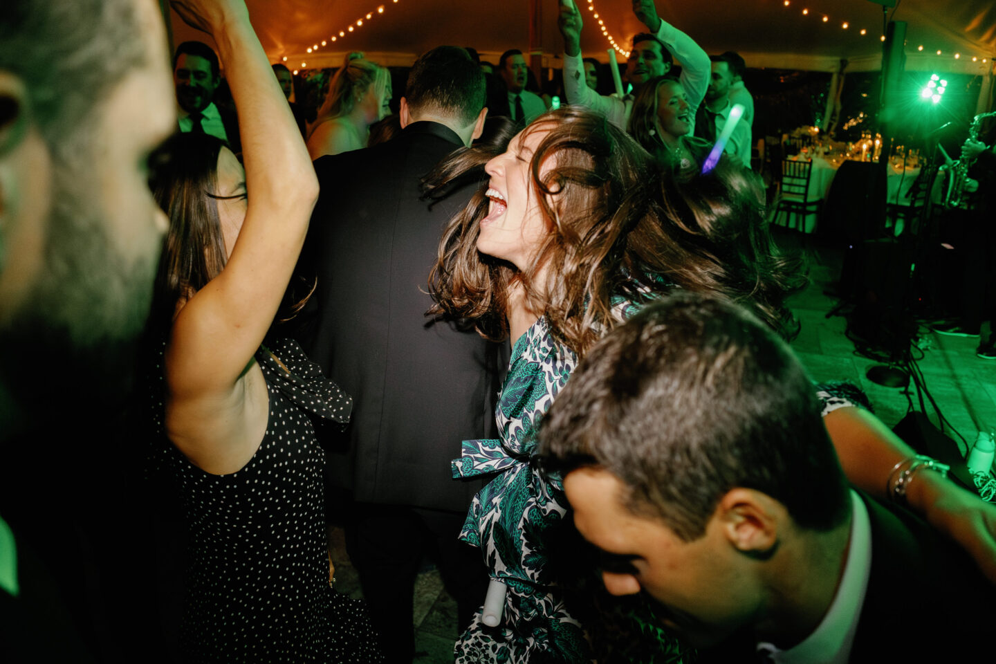 Elegant white sailcloth wedding tent amid autumn greenery at Bradley Estate in Canton, Massachusetts.